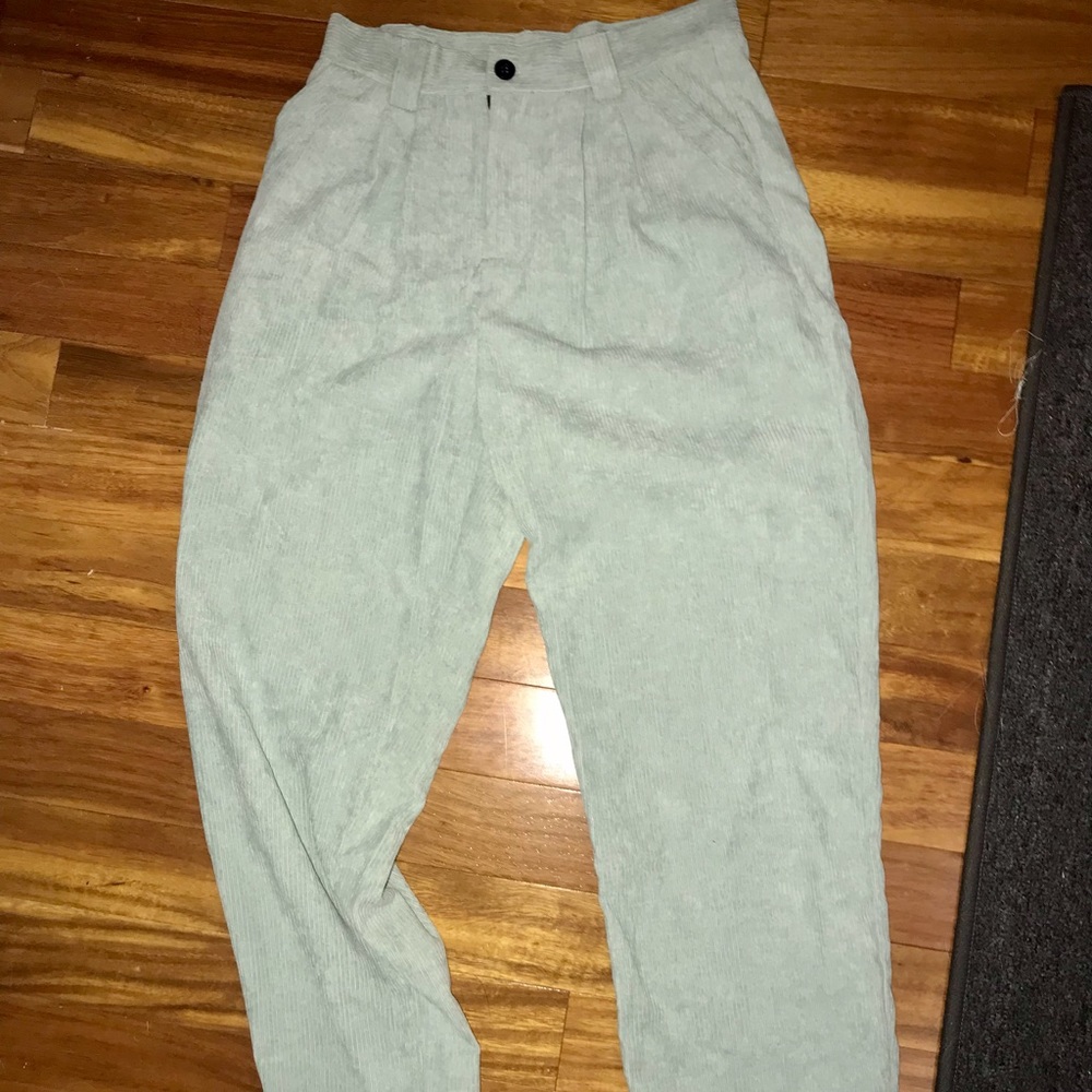 green corduroy pants